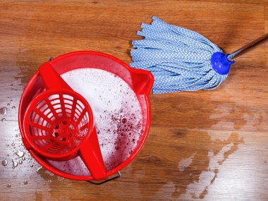 mopping of wooden floors clipart
