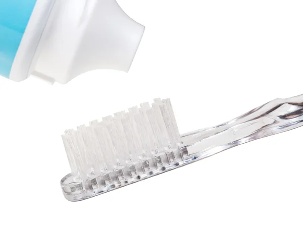 Toothbrush and toothpaste from tube — Stock Photo, Image