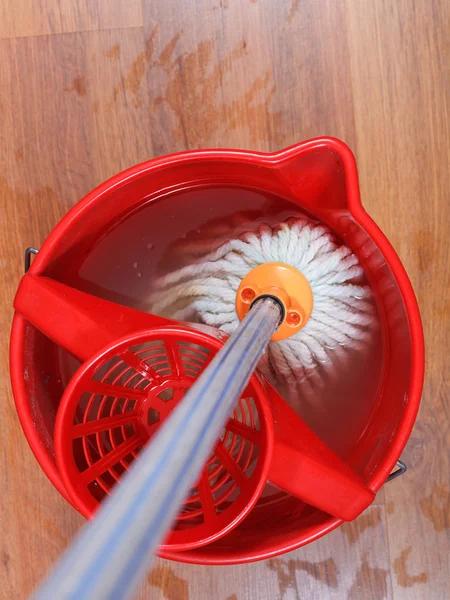 Textile mop in water — Stock Photo, Image