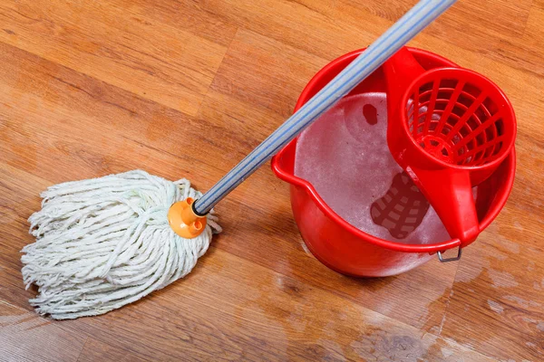Cleaning of wet floors by mop — Stock Photo, Image