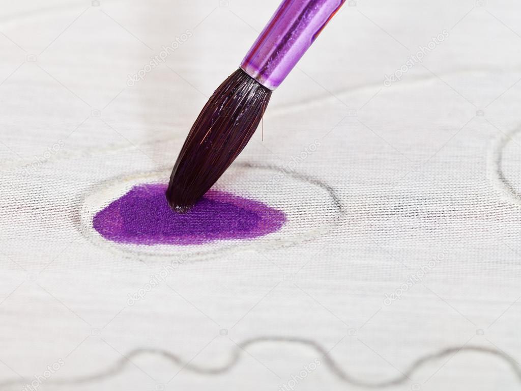 Drawing violet ornament on silk canvas