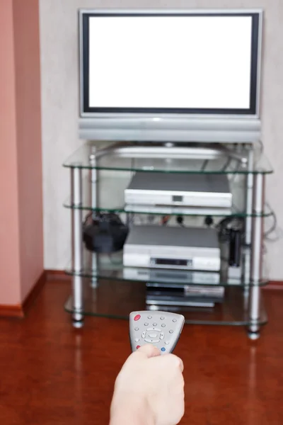 Selection of TV channels by remote control — Stock Photo, Image