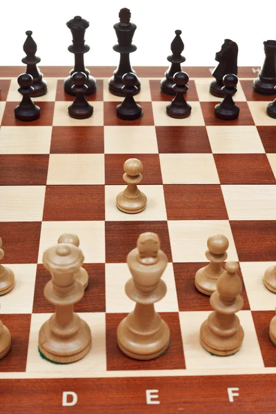 First move pawn on chessboard — Stock Photo, Image