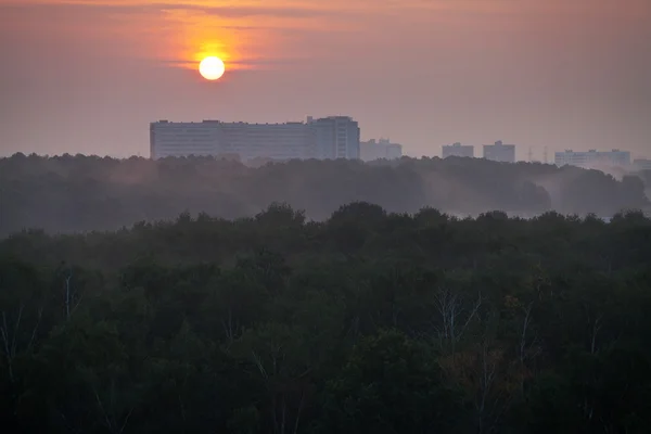 Panorama of red sunrise over city — Stock Photo, Image