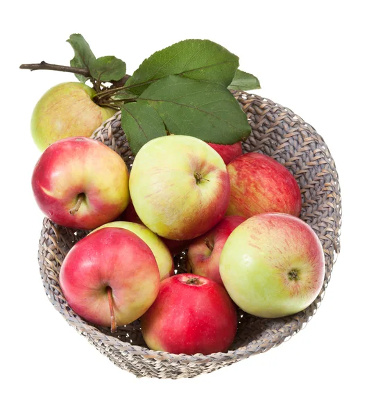 Basket with red and yellow apples isolated — Stock Photo, Image