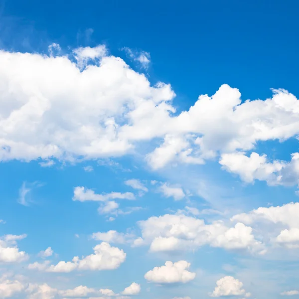 White clouds in blue sky in summer day — Stock Photo, Image