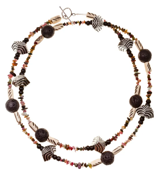 Halskette aus Lava, Knochen, Steinen, Metall — Stockfoto