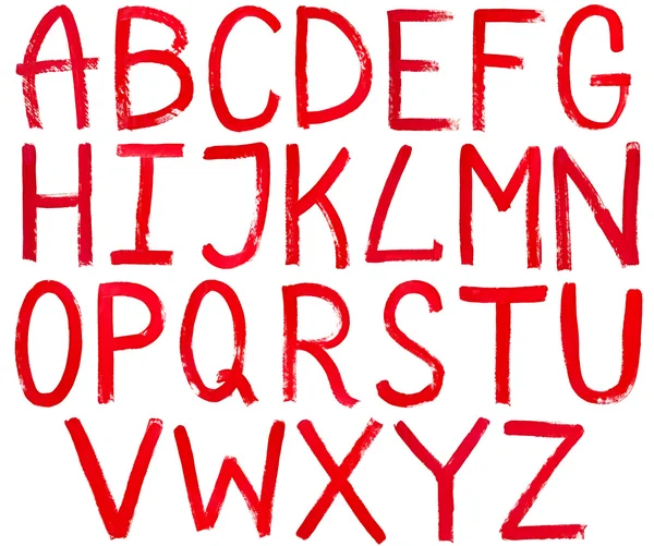 Capital letters hand written by red paint — Stock Photo, Image