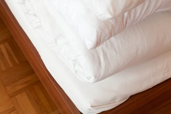 Tucked bedding in double bed — Stock Photo, Image