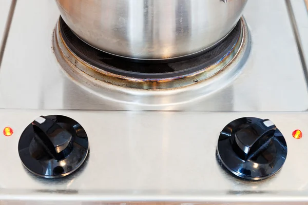 Pot on hotplate electric stove — Stock Photo, Image