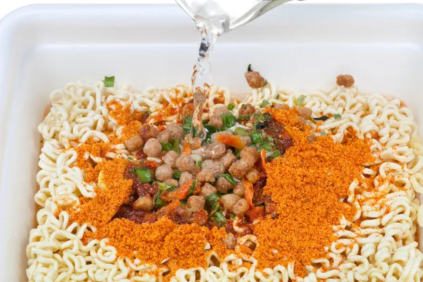 Cooking of instant noodles in foam cup — Stock Photo, Image