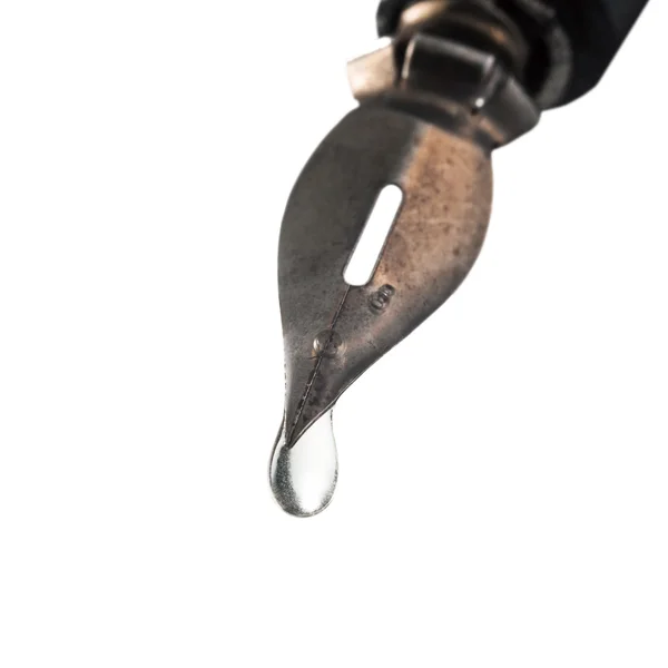 Fluid drop dripping from the tip pen — Stock Photo, Image