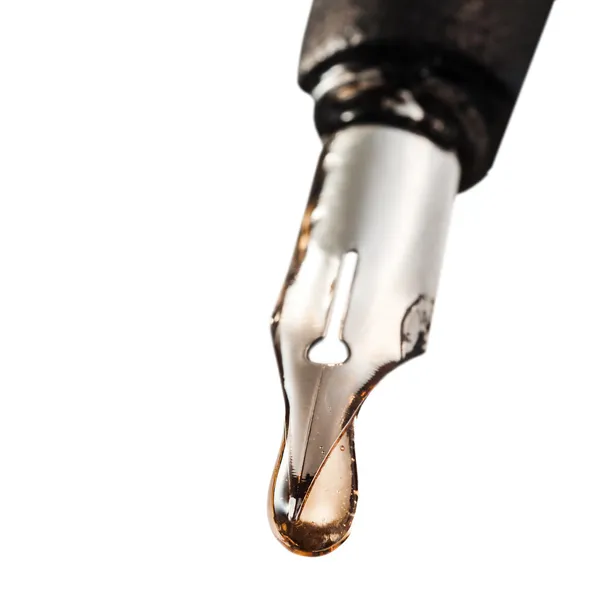 Drop of transparent poison on tip of pen — Stock Photo, Image