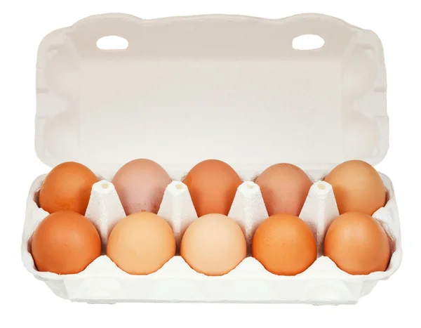 Diez huevos de pollo en un recipiente de cartón — Foto de Stock