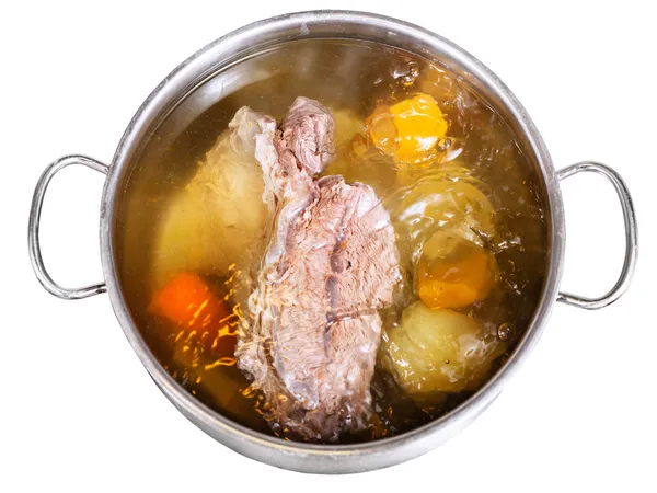 Open steel pan with cooking beef broth — Stock Photo, Image