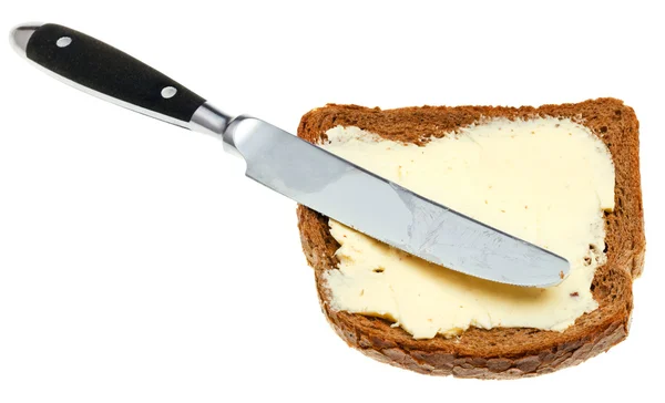 Bread and butter sandwich with table knife — Stock Photo, Image