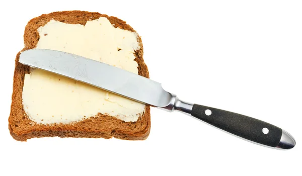 테이블 나이프와 버터 바른 빵 샌드위치 — 스톡 사진