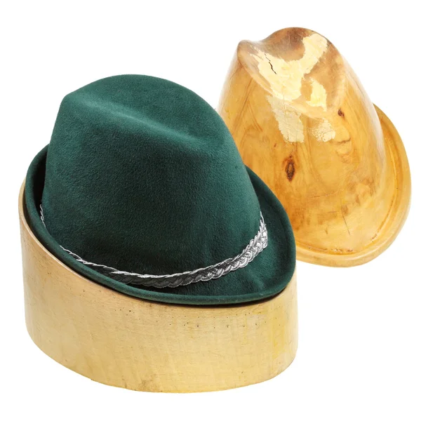 Tyrolean felt hat on linden wooden block — Stock Photo, Image