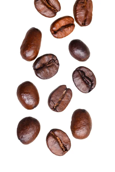 Fallende brente kaffebønner – stockfoto