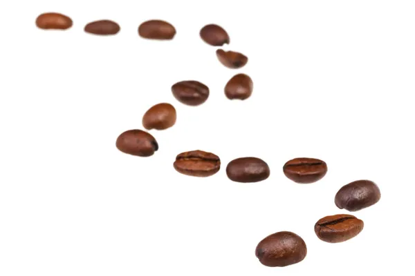 Zickzack-Muster aus vielen gerösteten Kaffeebohnen — Stockfoto