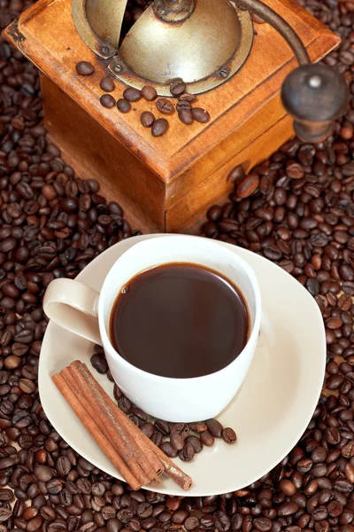 Cup of coffee and roasted beans — Stock Photo, Image