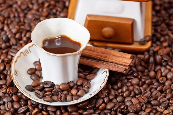 Cup of coffee and roasted beans — Stock Photo, Image