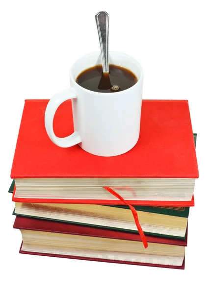 Hrnek kávy na stoh knih — Stock fotografie