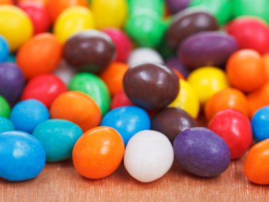 multi-colored chocolate candy dragees clipart