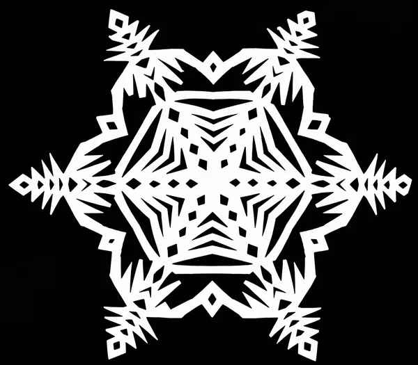 Snowflake on black paper — Stock Photo, Image