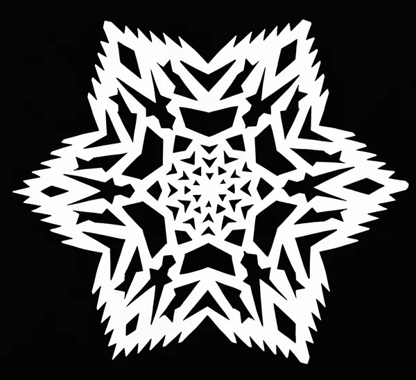 Snowflake on black paper — Stock Photo, Image