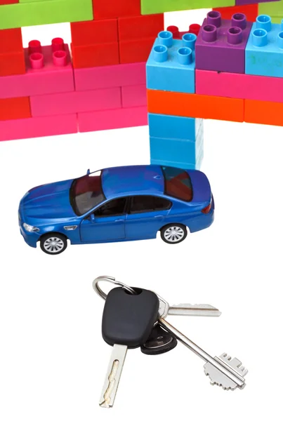Keys, model car, plastic block house — Stock Photo, Image