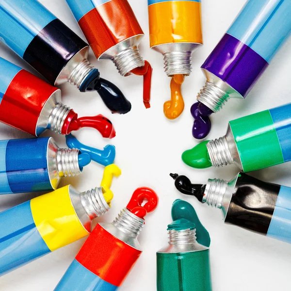 Multicolored tubes with squeezed watercolors — Stock Photo, Image