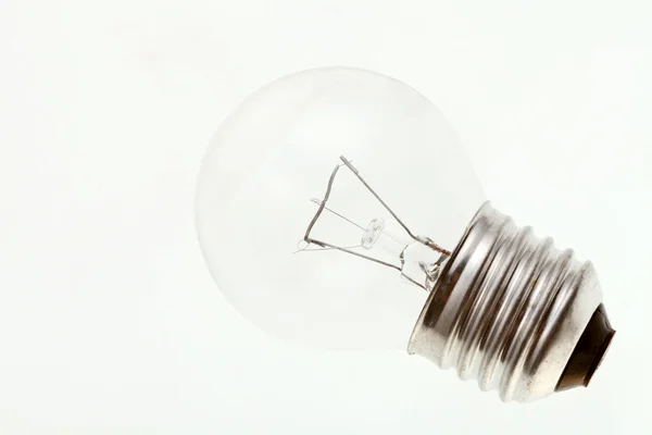 Small transparent incandescent light bulb — Stock Photo, Image