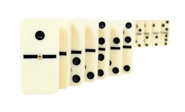 Linha de enrolamento de dominós isolados — Fotografia de Stock