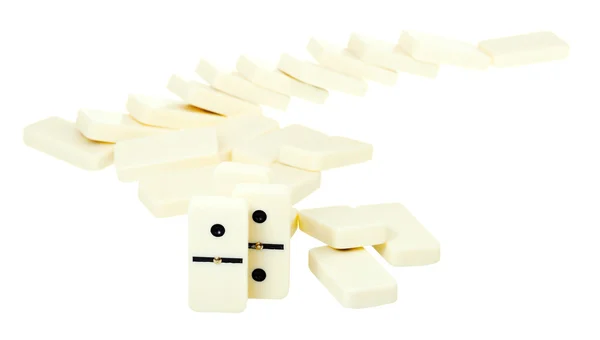 Winding line from fallen dominoes — Stock Photo, Image