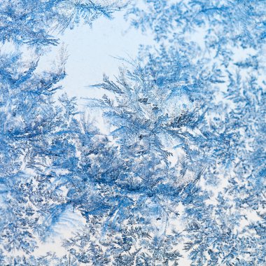kar taneleri ve frost desen cam üzerinde kapat
