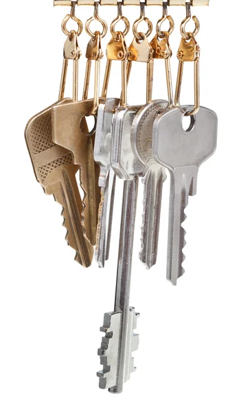 Home keys on pendants isolated on white — Stock Photo, Image