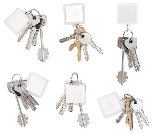 Set of bunch of door keys with blank keychain — Stock Photo, Image