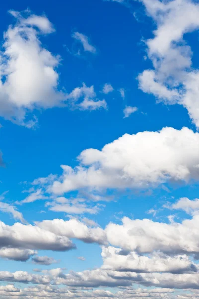 White fluffy clouds in blue sky — Stock Photo, Image