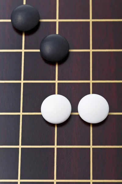 Top view of few stones during go game playing — Stock Photo, Image