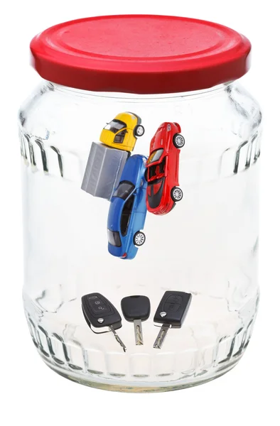 New cars in closed glass jar — Stock Photo, Image