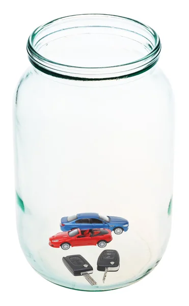New vehicle and keys in glass jar — Stock Photo, Image