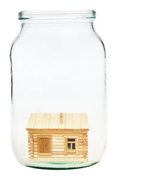在玻璃罐里的木制村屋 — 图库照片