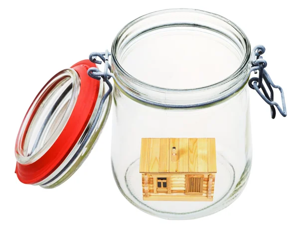 Casa de madera en tarro de vidrio — Foto de Stock