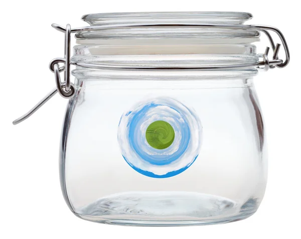 Little clear green planet in glass jar — Stock Photo, Image