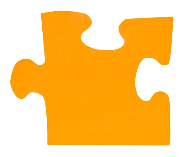 One orange paper piece of jigsaw puzzle — Stock Photo, Image