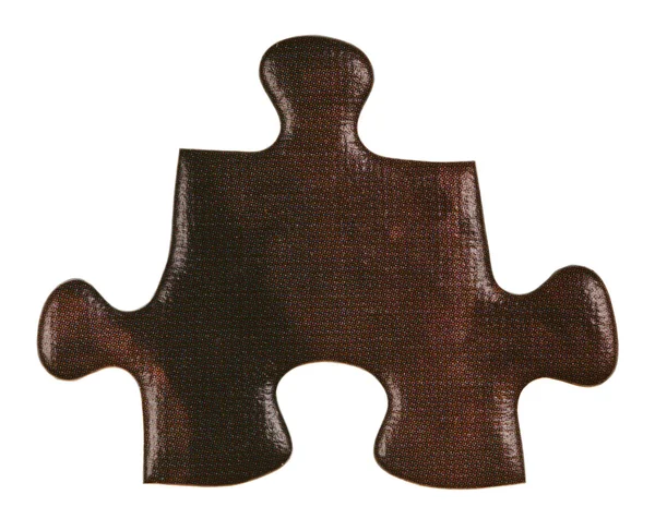 One brown piece of jigsaw puzzle — Stock Photo, Image