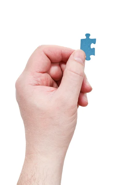 Male arm with jigsaw puzzle piece — Stock Photo, Image