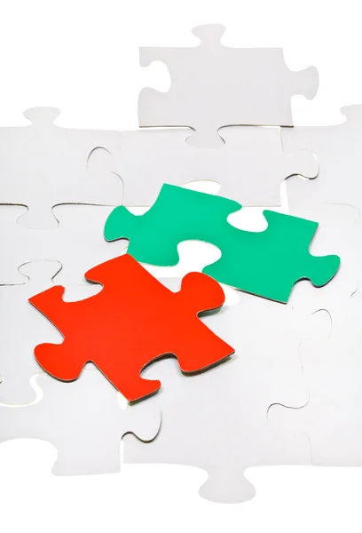 Red piece on free space of connected puzzles — Stock Photo, Image