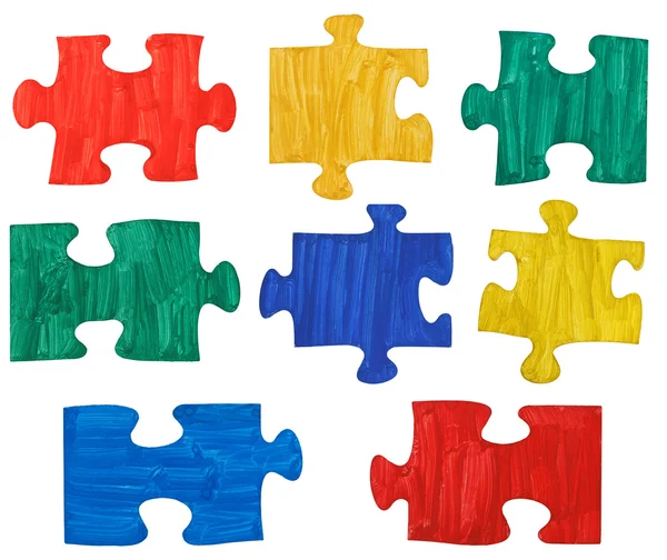 Jeu de pièces de puzzle colorées peintes — Photo